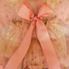 Back of a of a floral event dress for children perfect for special occasions such as wedding, birthdays or family photos.