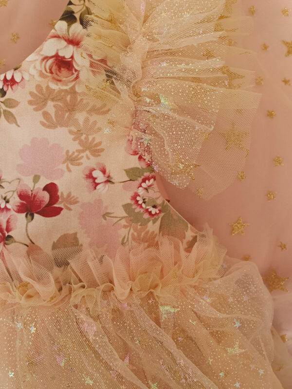 Upper quarter of a floral event dress for children perfect for special occasions such as wedding, birthdays or family photos.