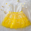 Yellow and white children’s occasion dress with daisy tulle skirt and shoulder details