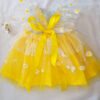 Yellow and white children’s occasion dress with daisy tulle skirt and shoulder details