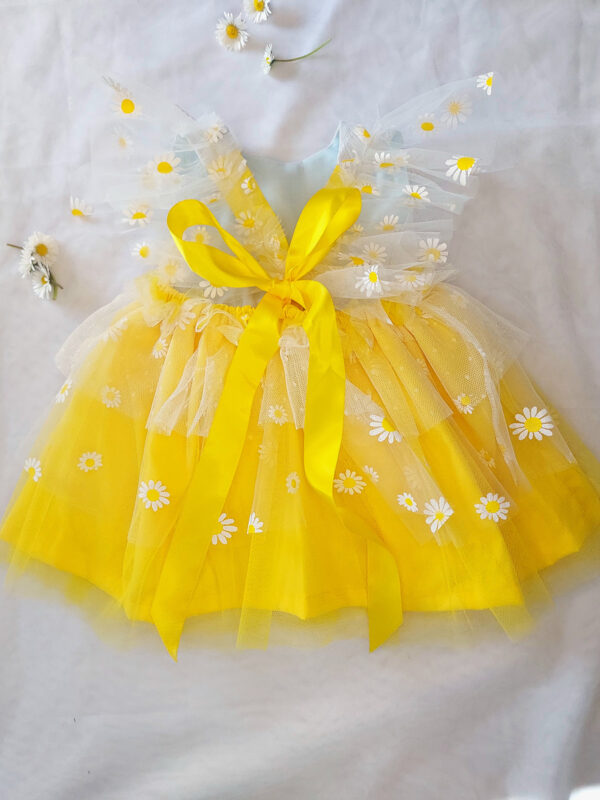Yellow and white children’s occasion dress with daisy tulle skirt and shoulder details