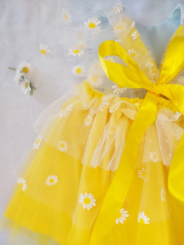 Yellow and white children’s occasion dress with daisy tulle skirt and shoulder details